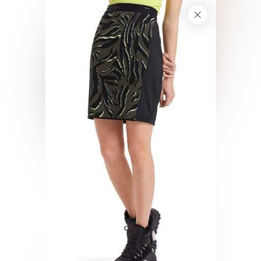Marc Cain (made in Germany) black skirt with animal print detail.